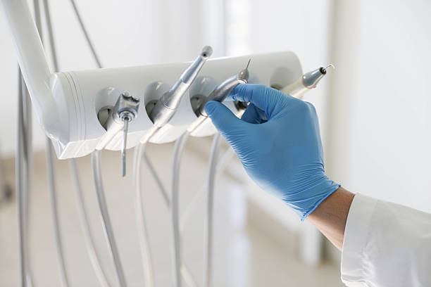 Professional Tooth Extraction technician working in Elmo, TX